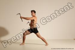 Underwear Fighting with axe Man White Muscular Short Brown Dynamic poses Academic